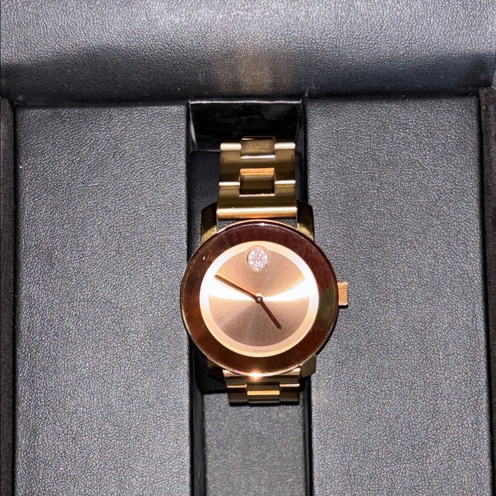 Gold-Tone Watch with Crystal Accent. Excellent condition Movado  Bold.